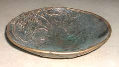 image of a cast-bronze bowl